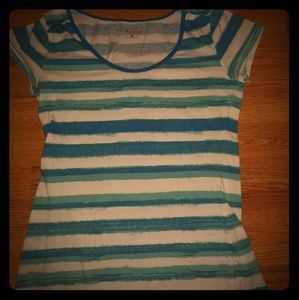 Tourqoise striped shirt.